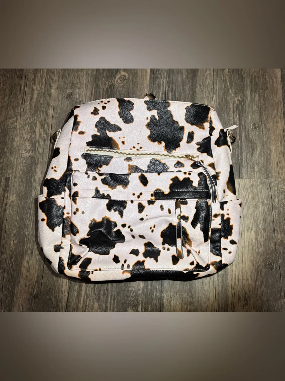 Cow Print Backpack with Front Zip Pocket